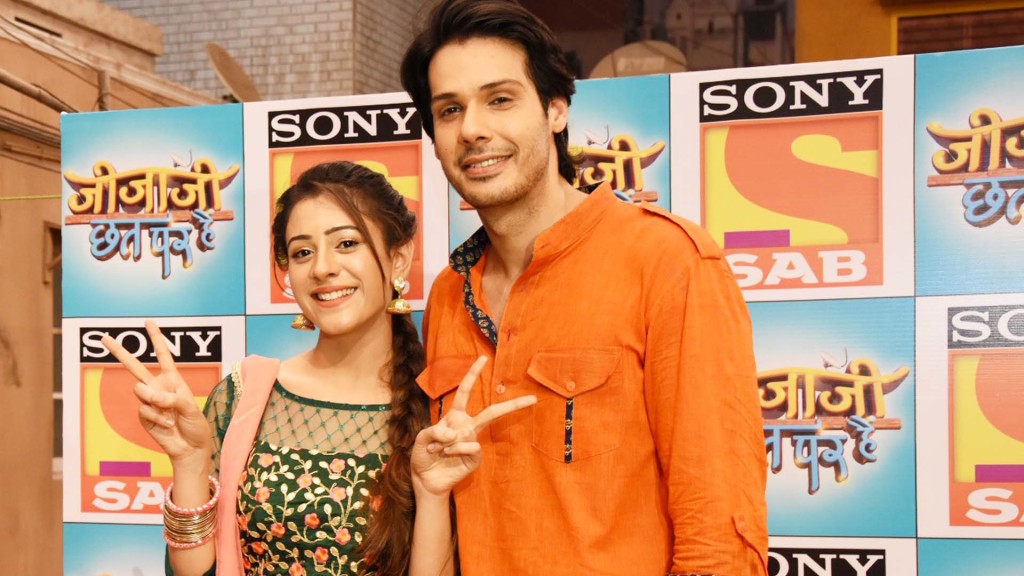 Hiba Nawab as Elaichi and Nikhil Khurana as Pancham during the 100 episodes completion celebrations  of Sony SAB's Jijaji Chhat Per Hain